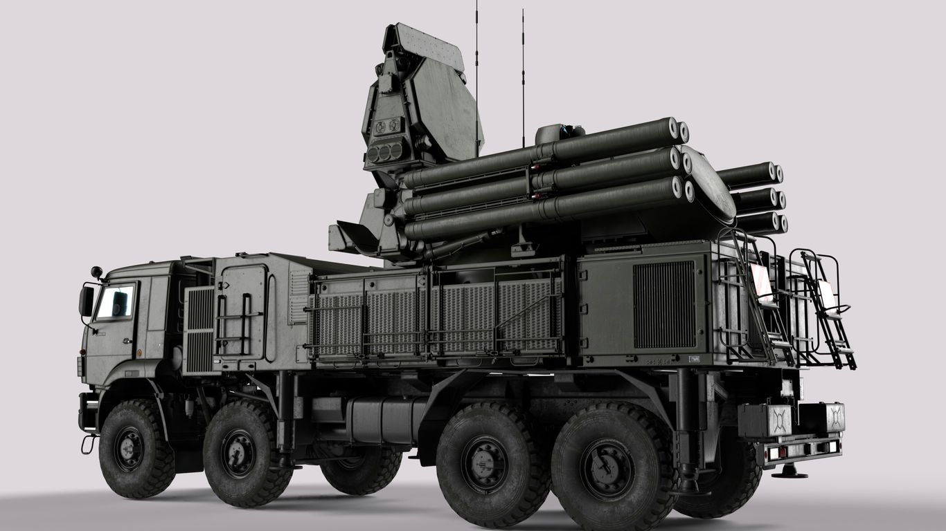 a large military truck with a missile on top of it