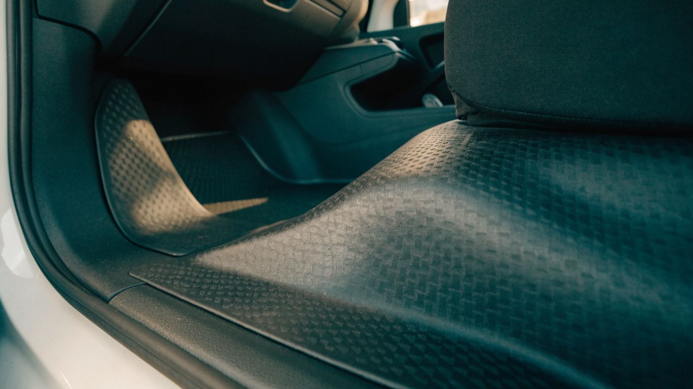 Close view of textured floor liners inside an SUV