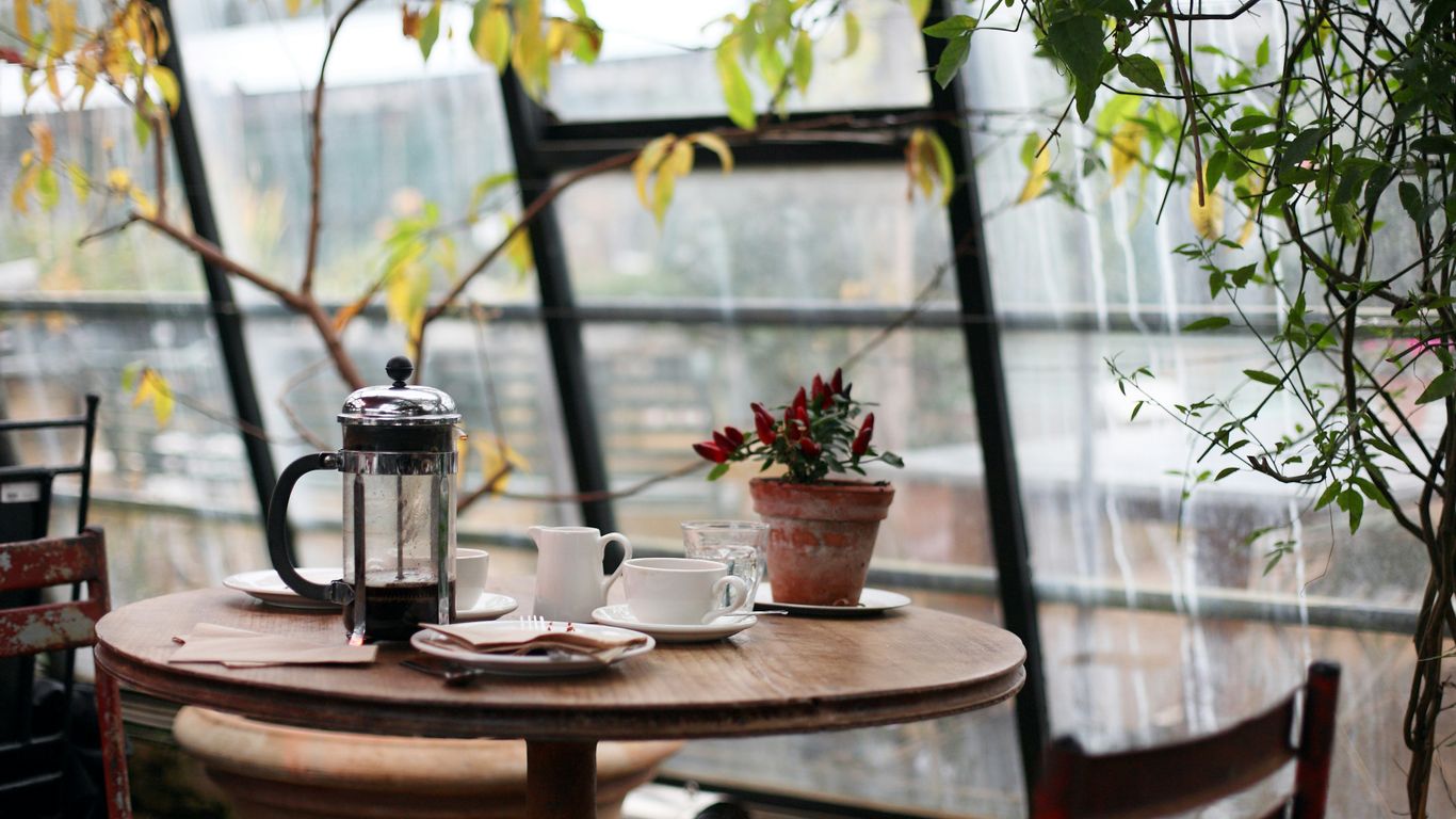 A inviting table setup inside a local cafe