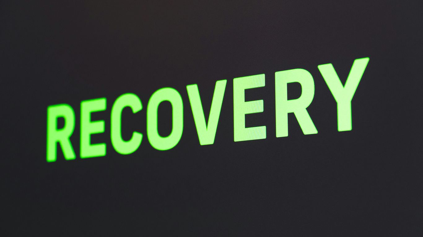 a close up of a sign that reads recovery