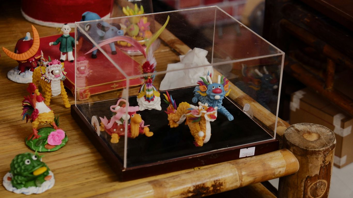 clear glass fish tank on brown wooden table