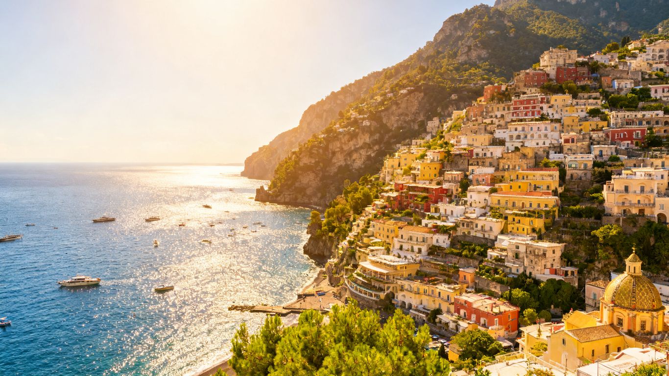 Colorful houses on a cliff overlooking the Mediterranean Sea.