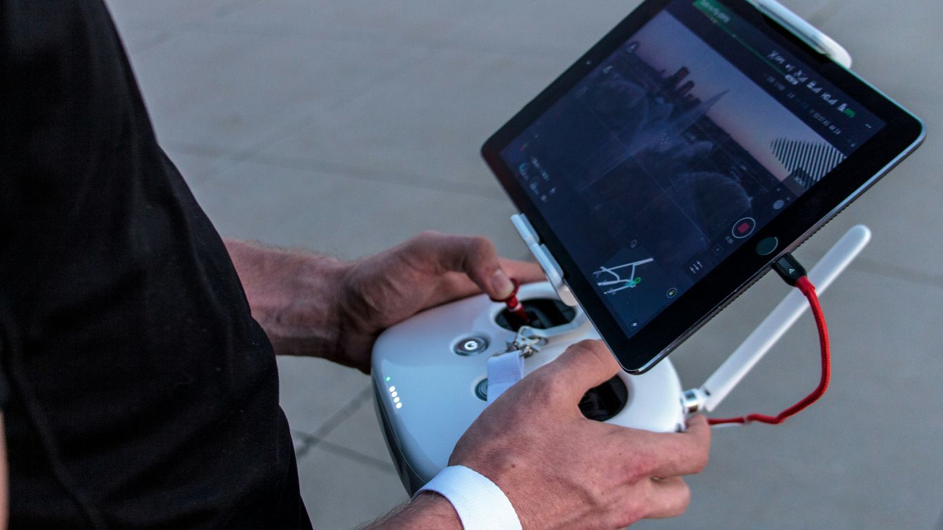 A futuristic drone GCS screen showing fleet status