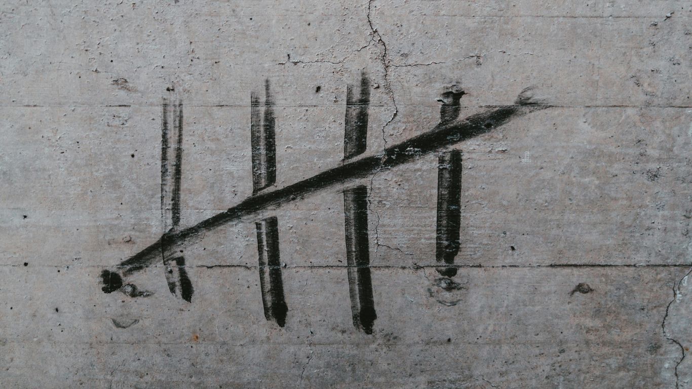 a piece of concrete with a line drawn on it