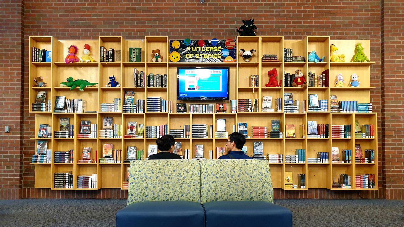 unknown persons watching TV