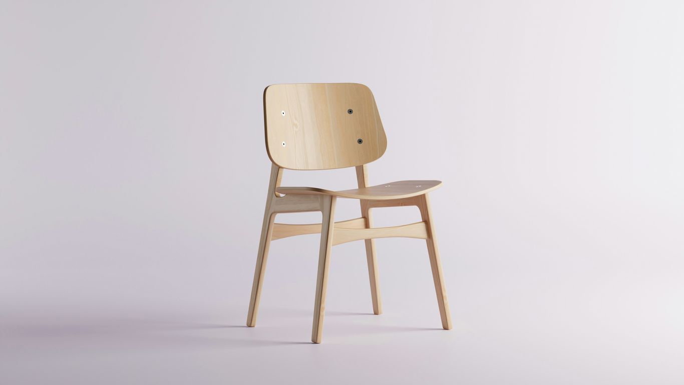 Dining chairs beside a stone tabletop