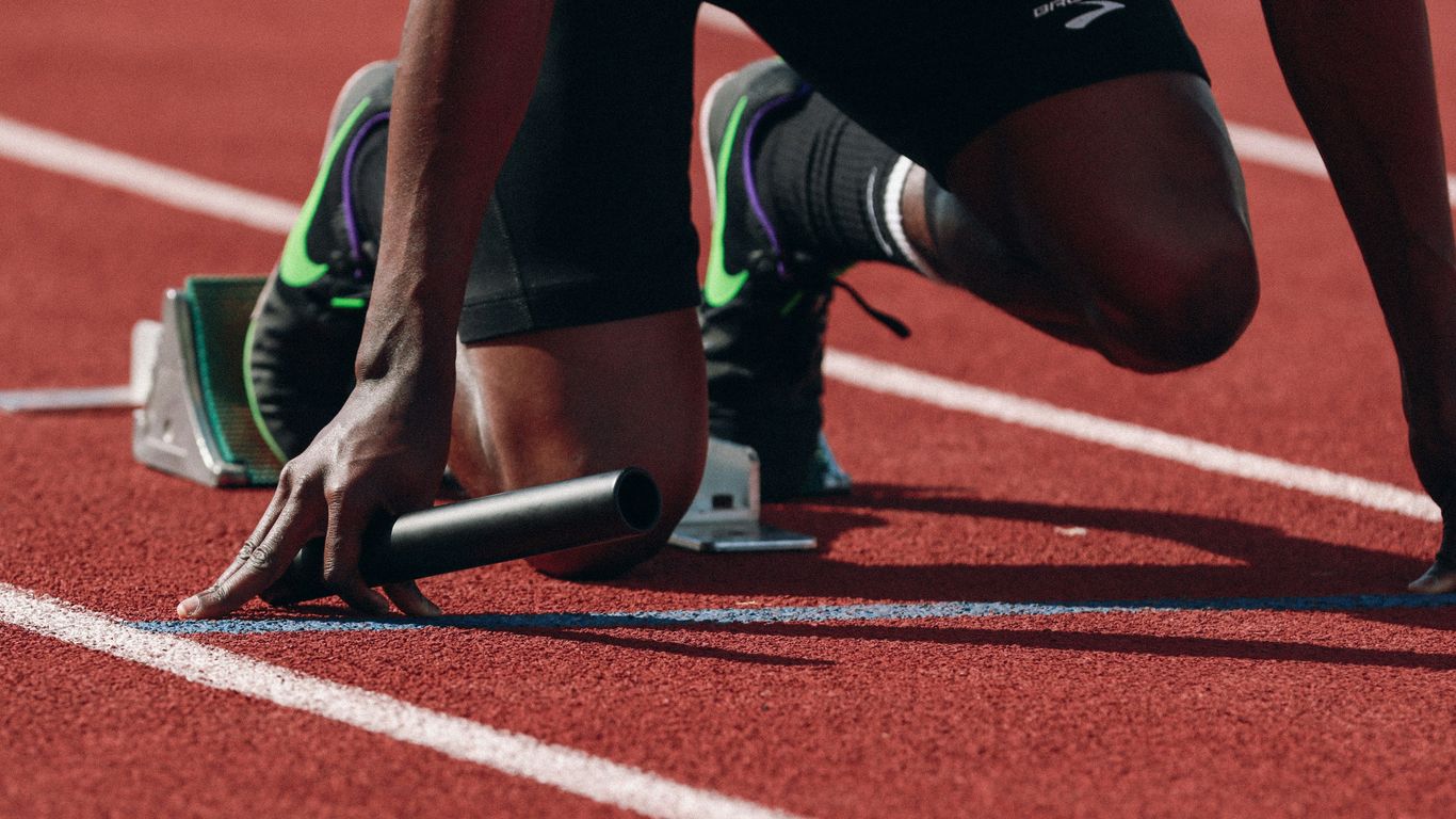 man on running field