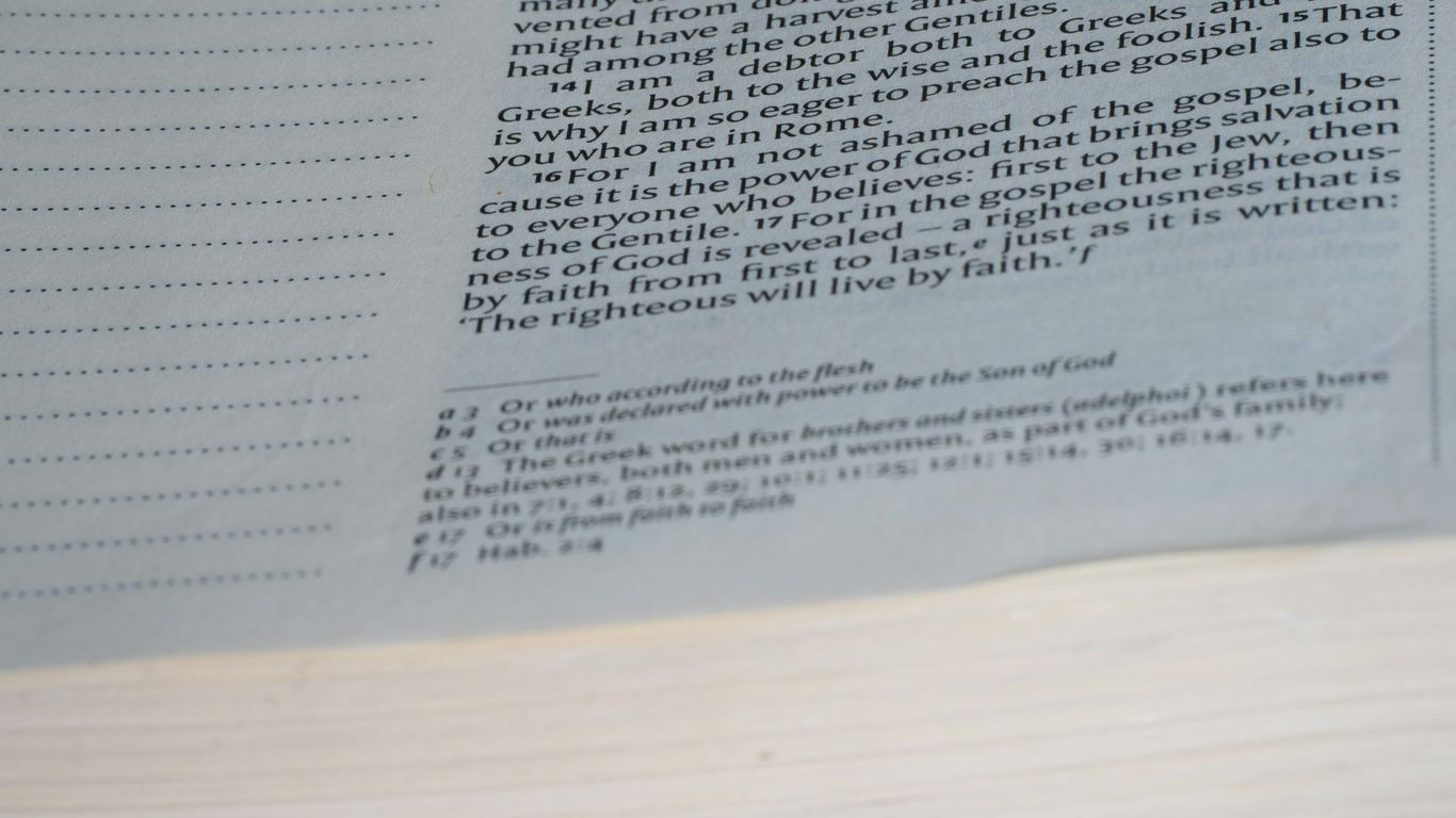 A close up of an open book on a table