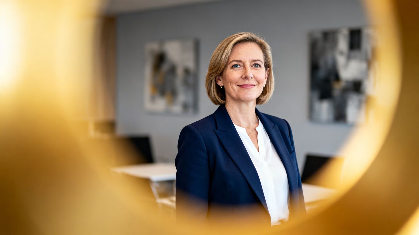 Alison Atkinson, senior editor, in a professional setting.