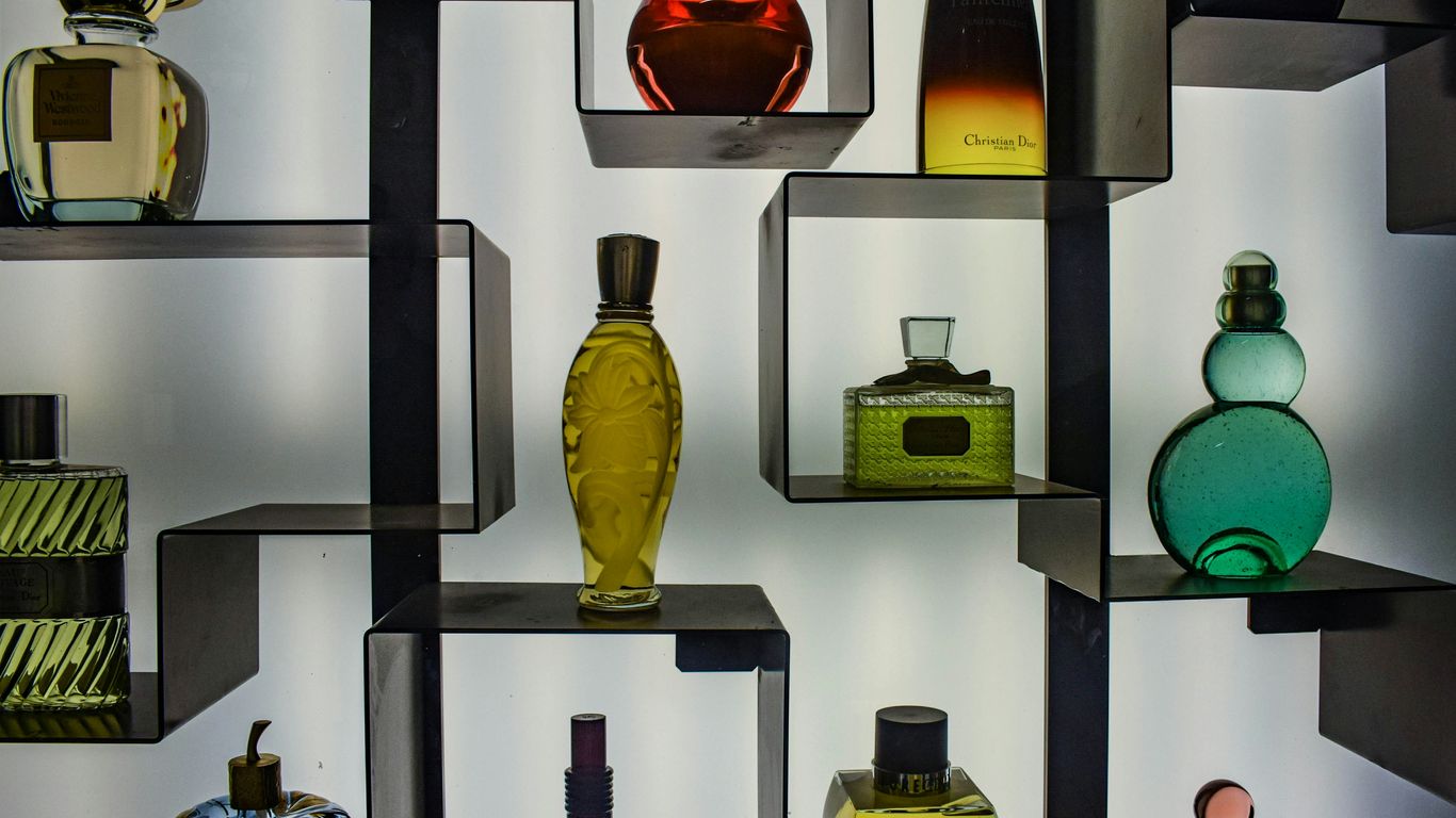 Rows of bottles displayed in a high-shelf tower