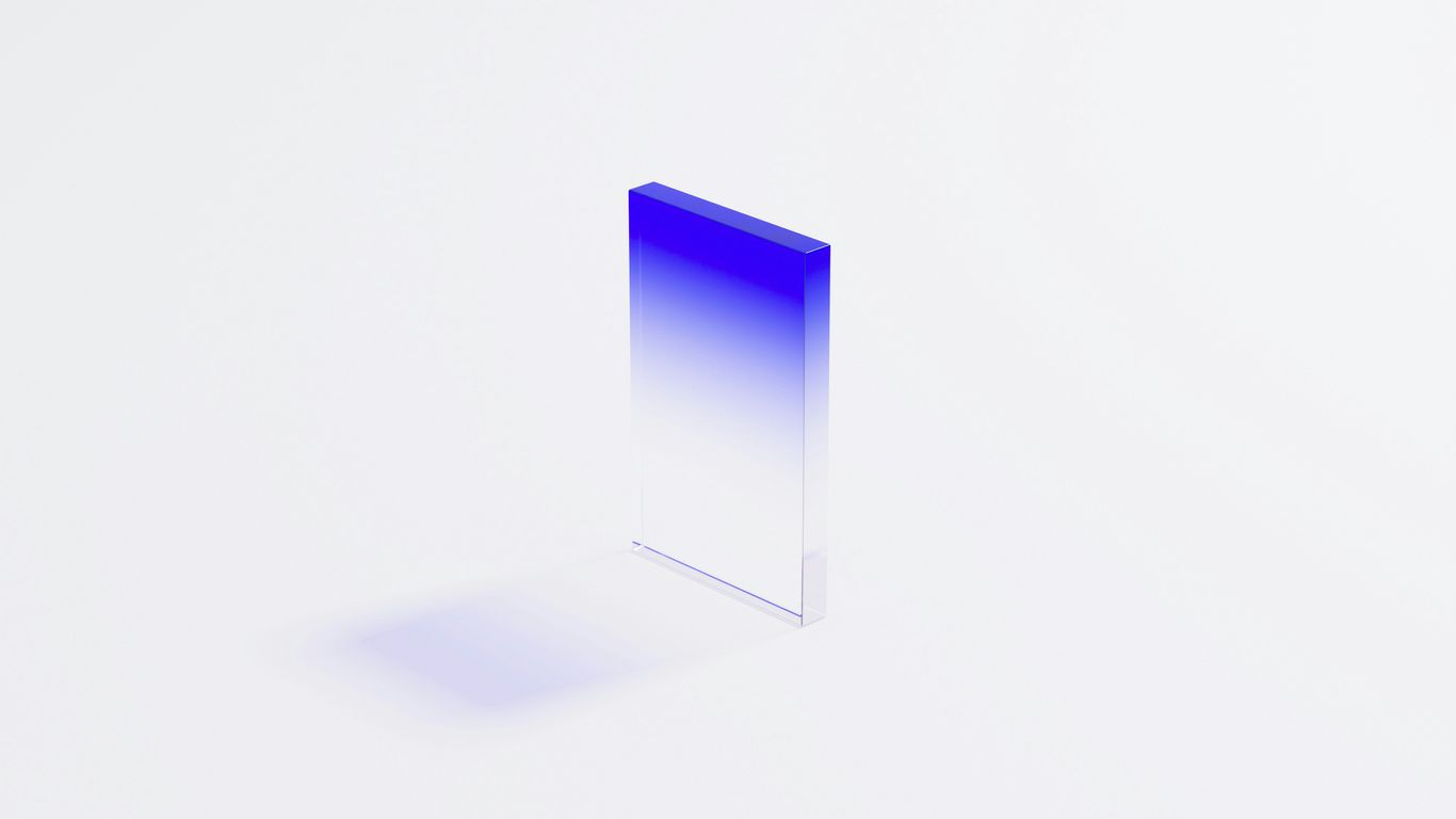 a blue and white square shaped object on a white surface