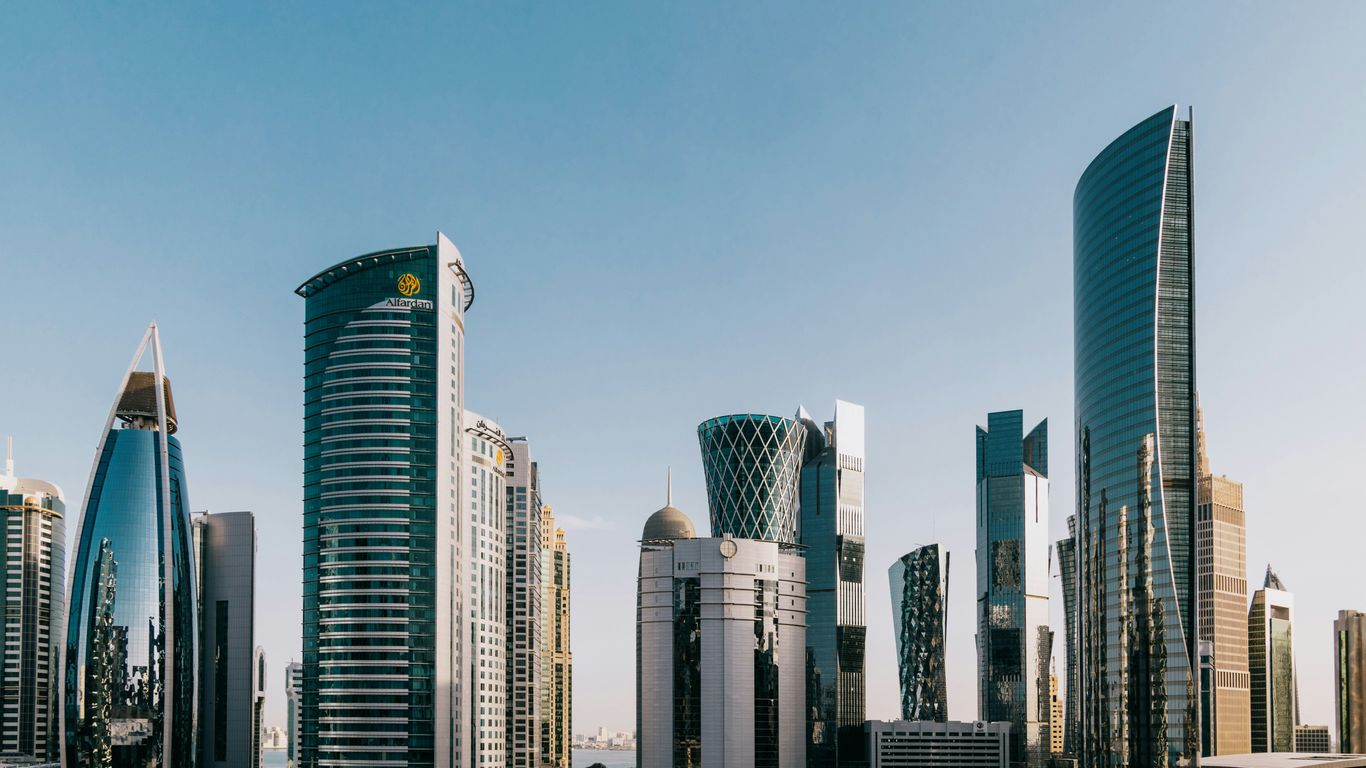 a group of tall buildings in a city