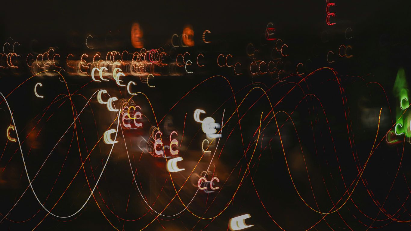 a blurry photo of a city at night