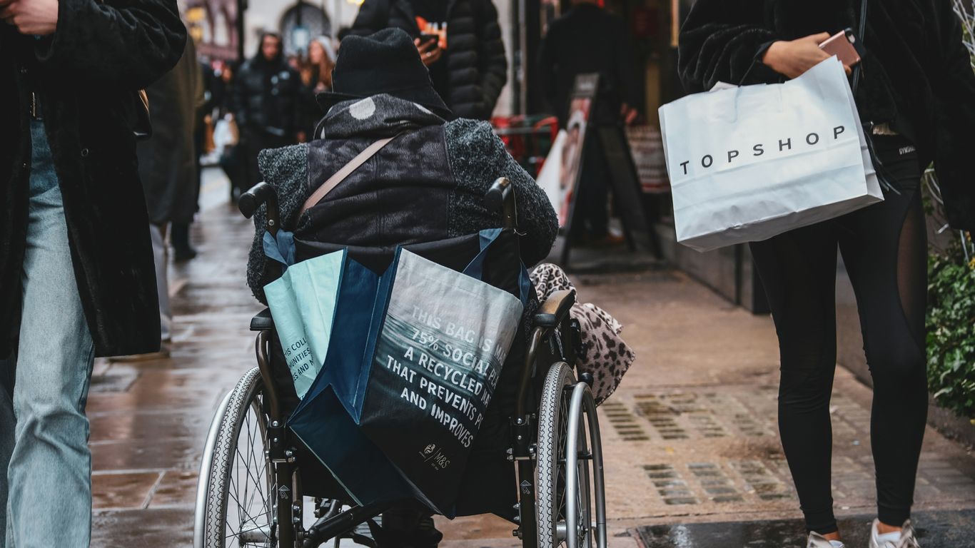 man sitting on wheelchair