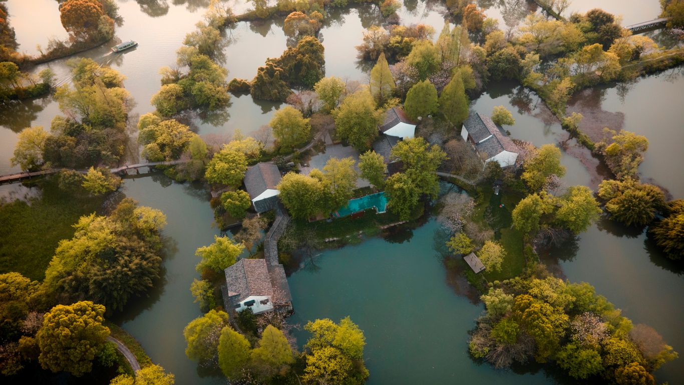 An aerial view showing green wetland ponds and vegetation