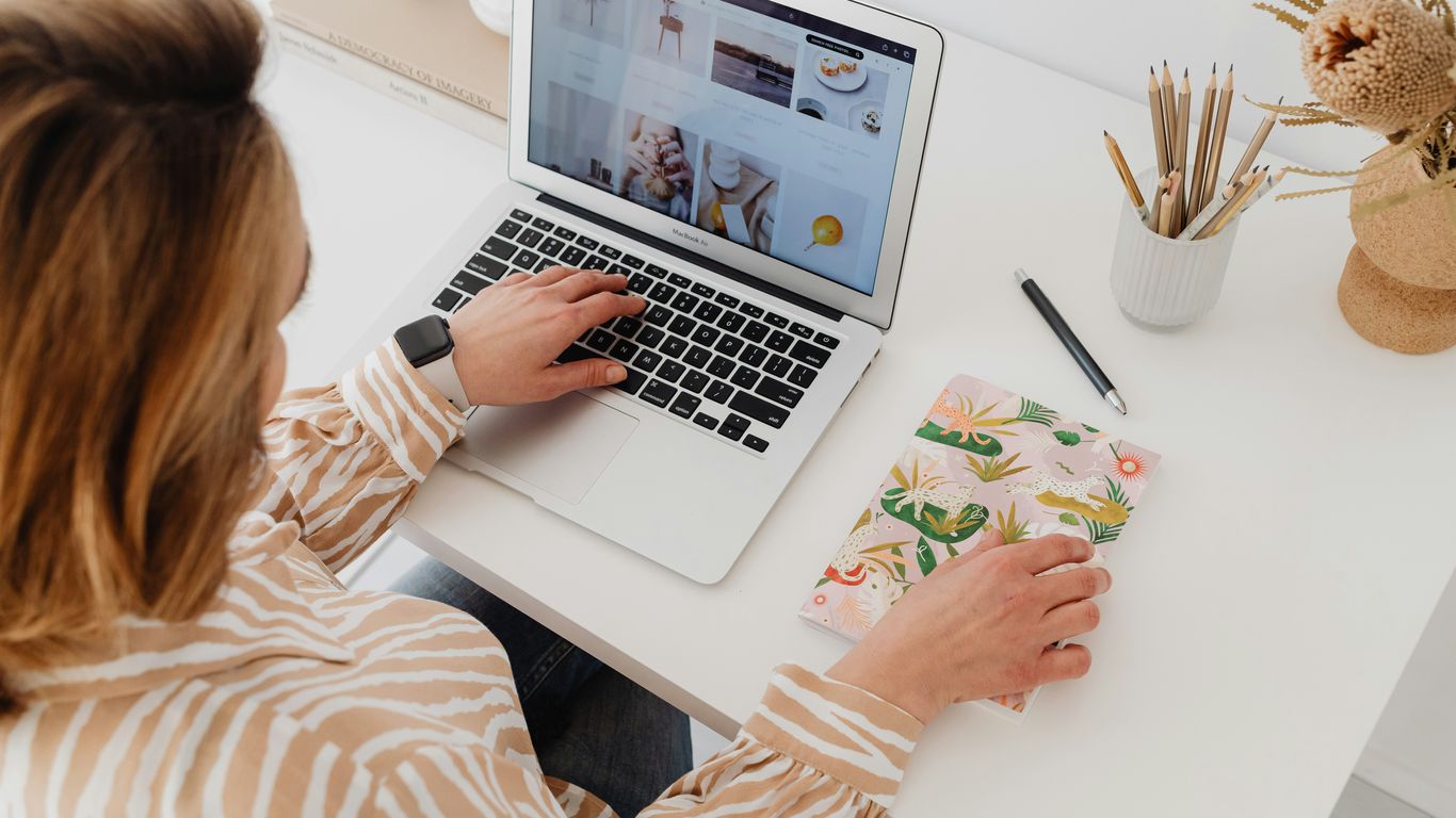 a woman working on a laptop