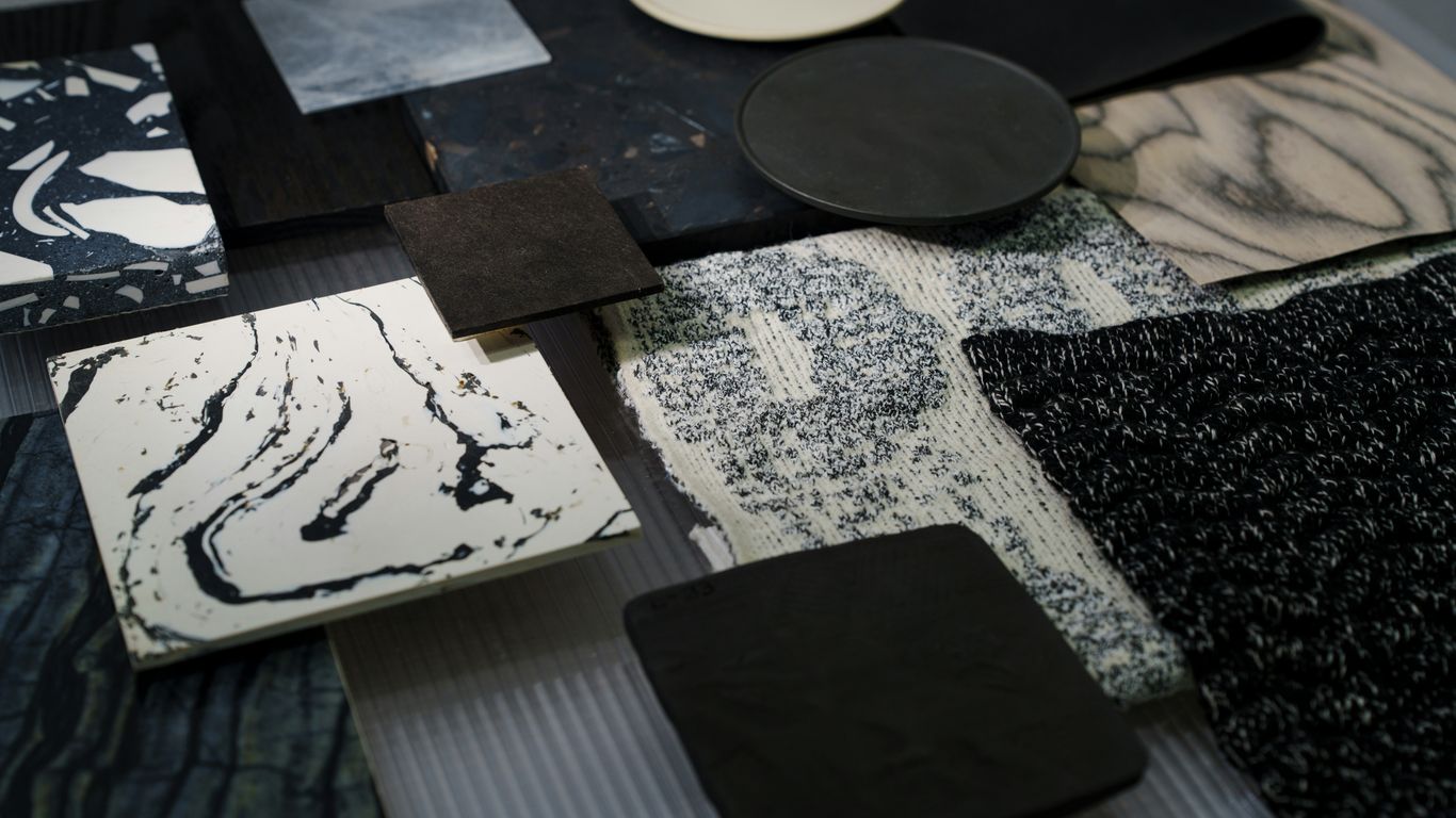 Stone samples beside furniture finish options
