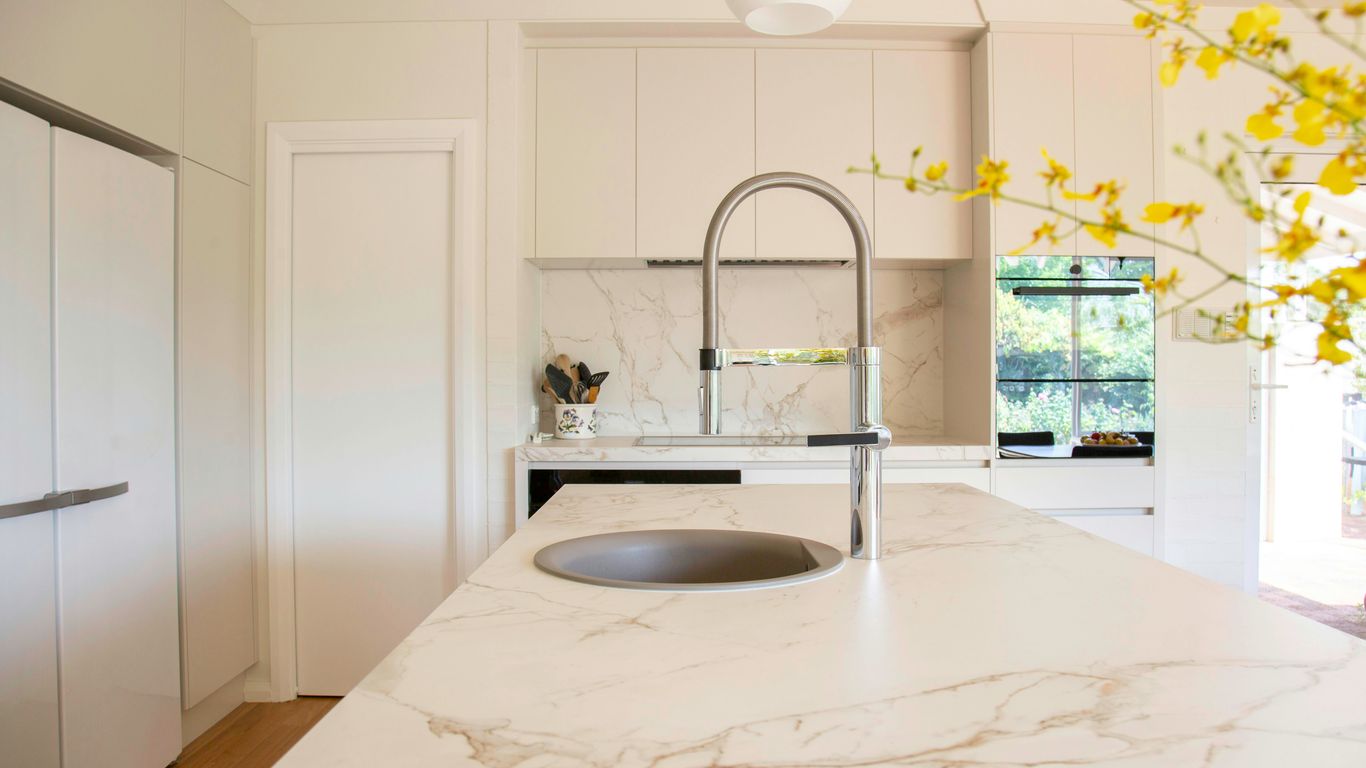 Detail of marble basin tap and bowl