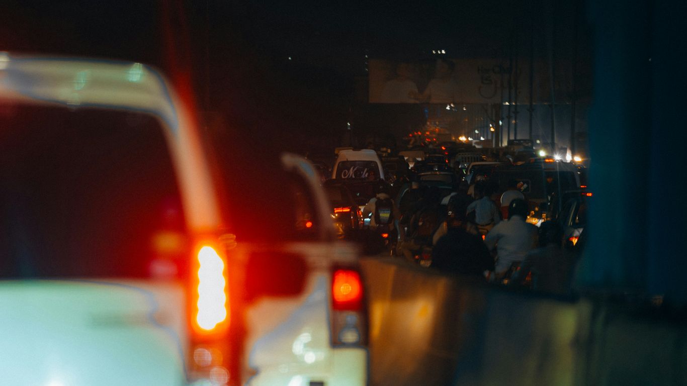 a bunch of cars that are sitting in the street