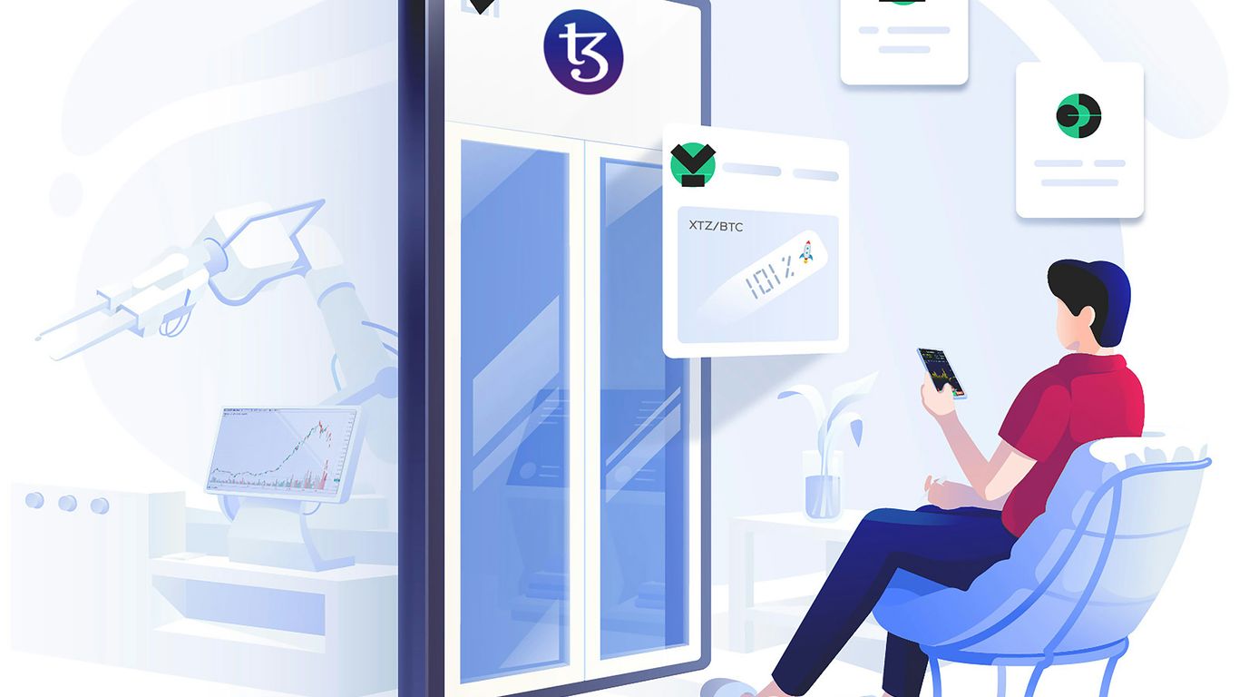 a man sitting in a chair looking at his cell phone