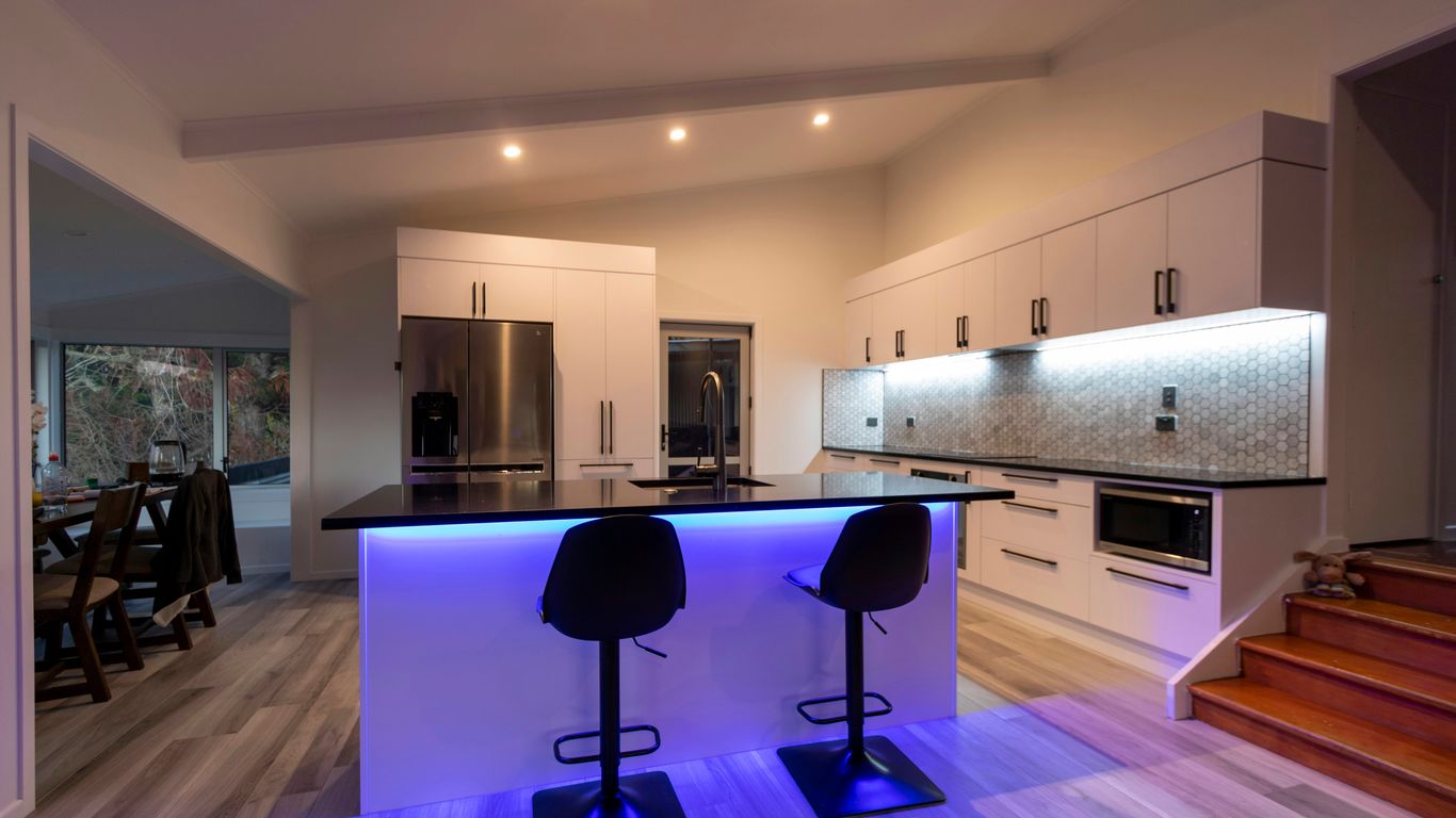 black and purple chairs on brown wooden floor
