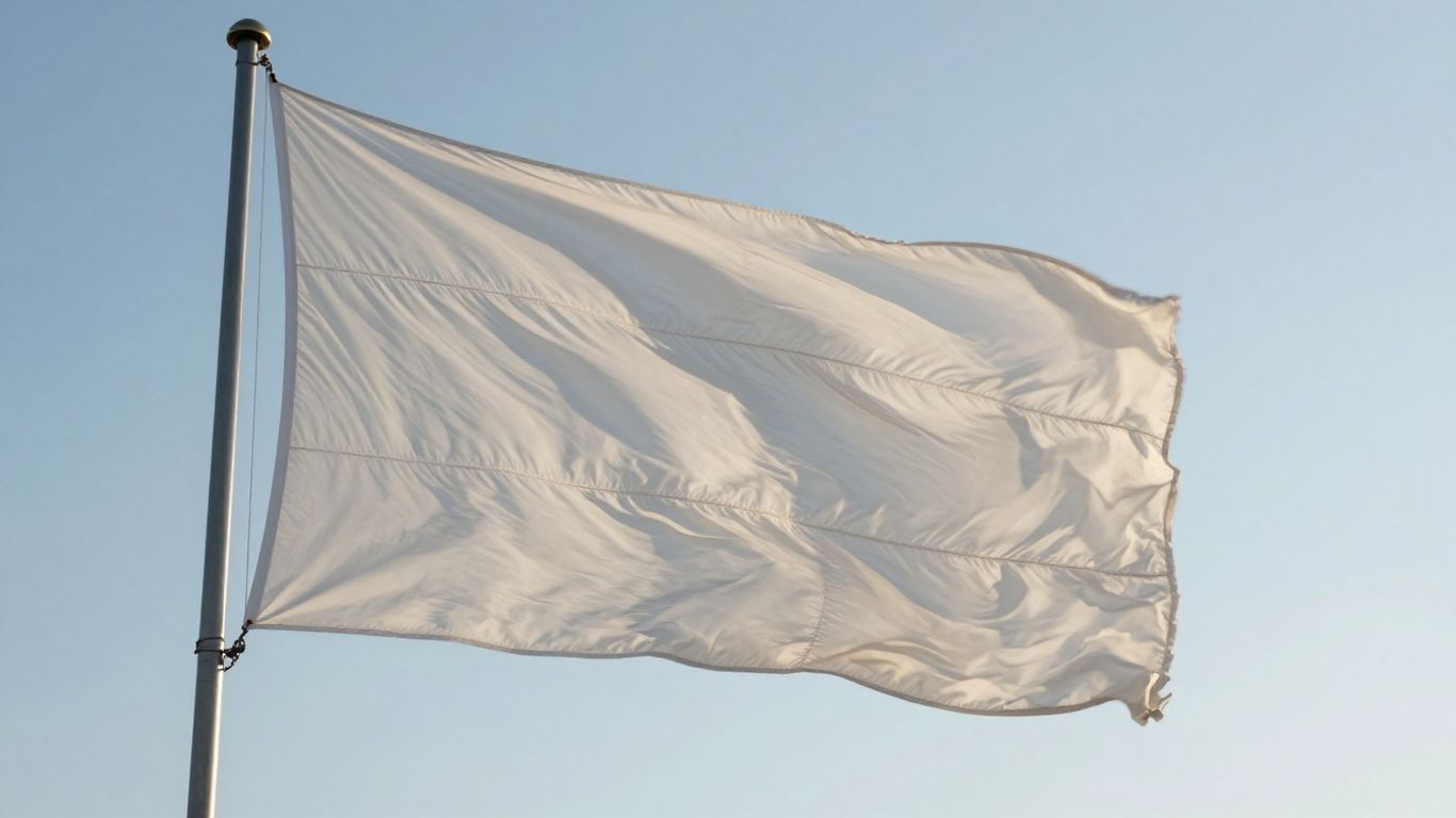 Flag waving against a clear morning sky