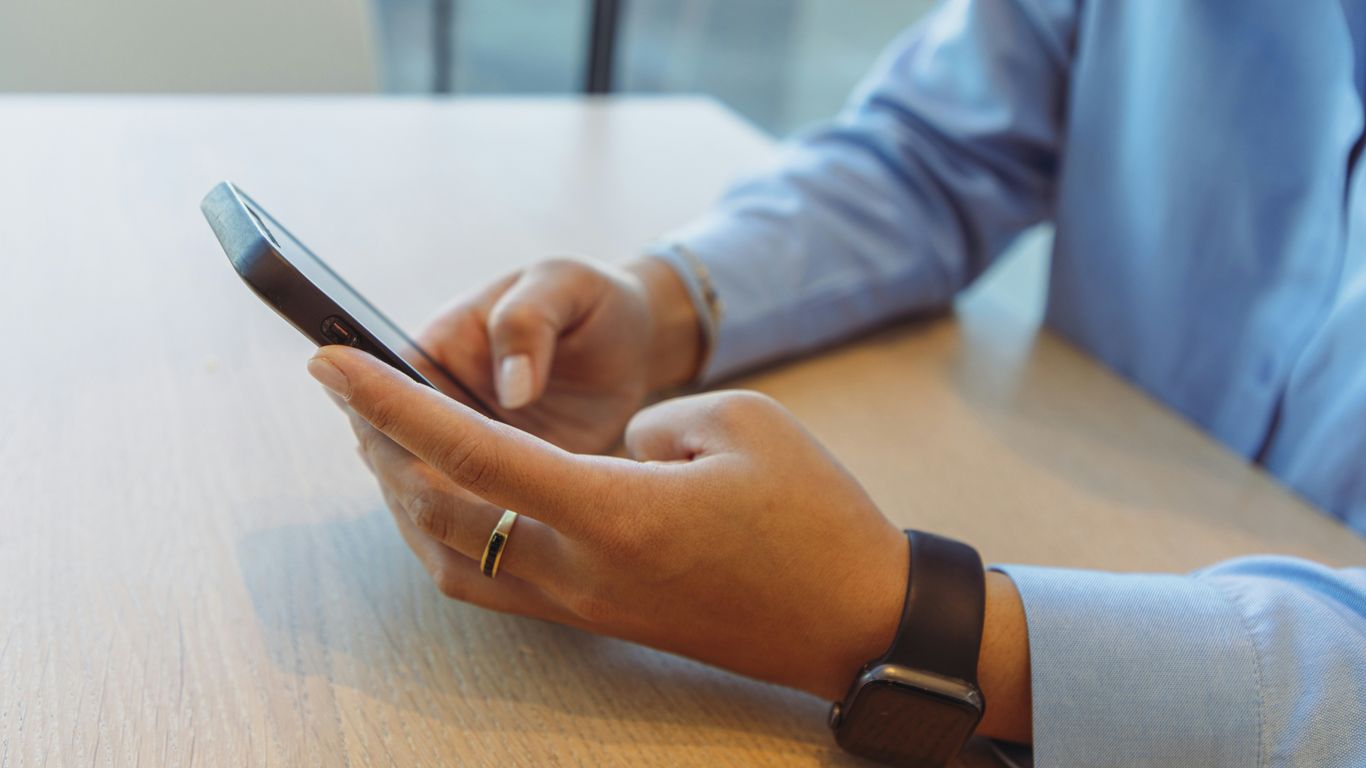 a person holding a pen