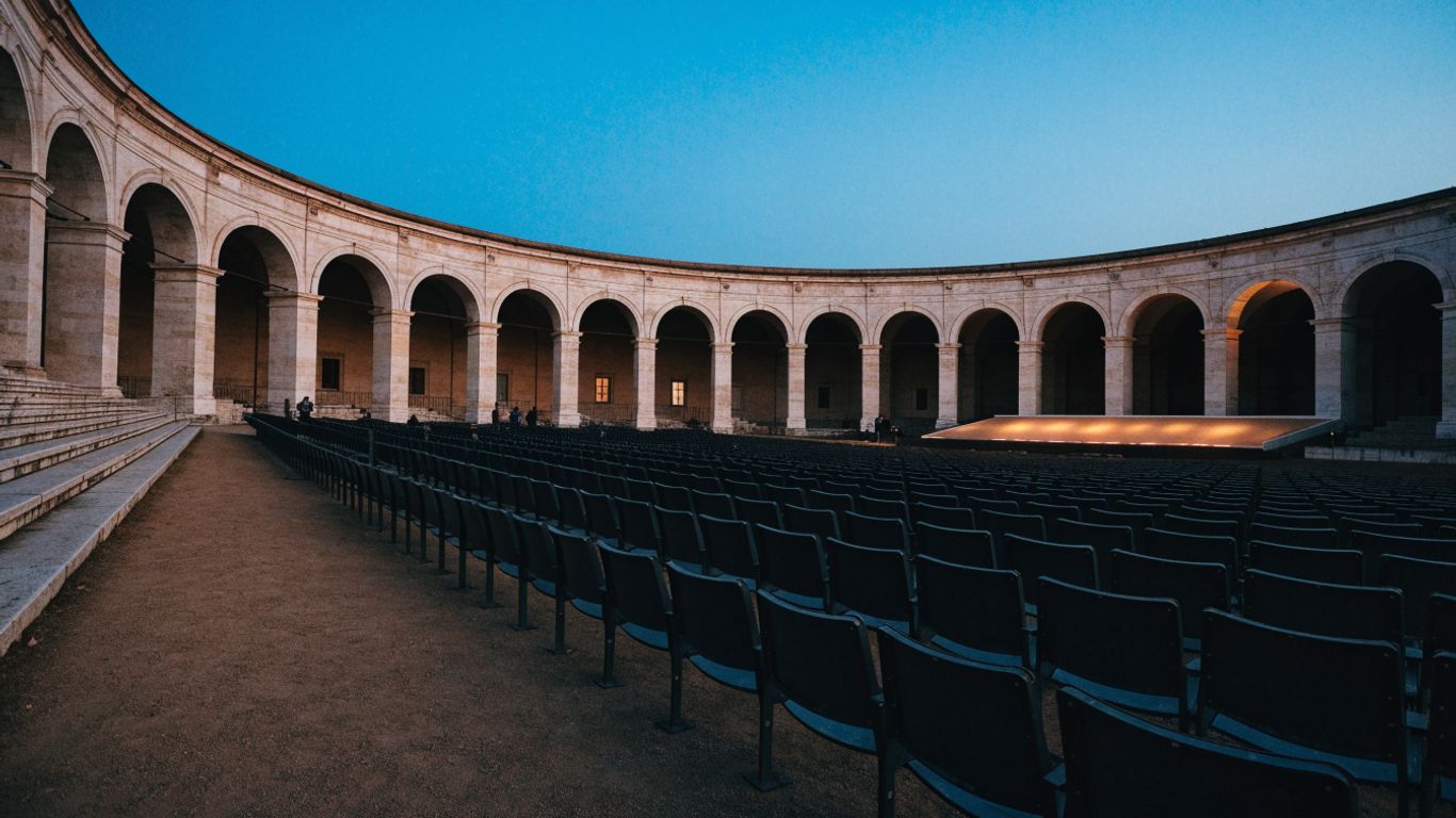 Open-air Sferisterio arena at dusk