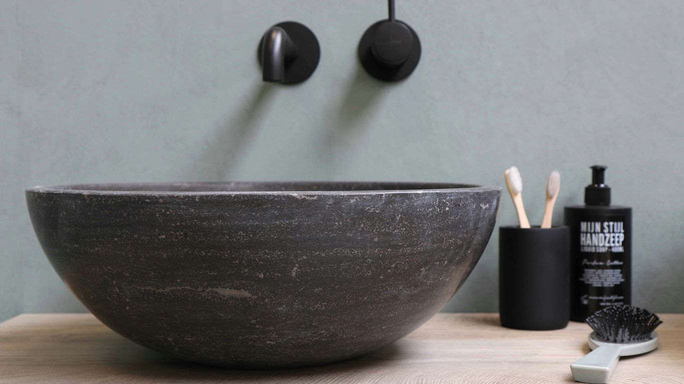 Close view of a veined marble basin