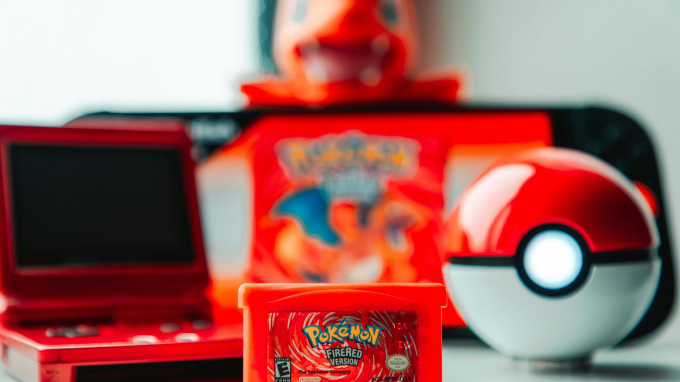 Pokemon game cartridge and accessories on-the-go gaming console