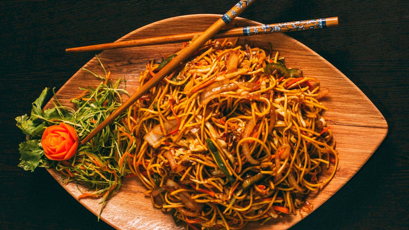 pasta dish on brown ceramic plate