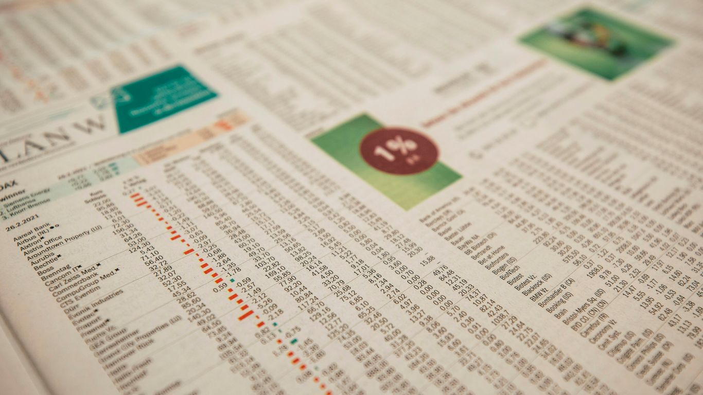 white printer paper with red and green round sticker