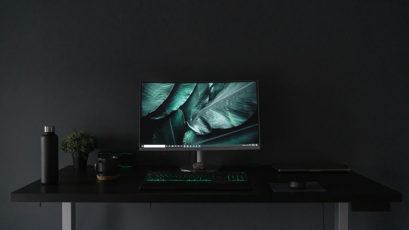 A clean minimalist desk setup with signage