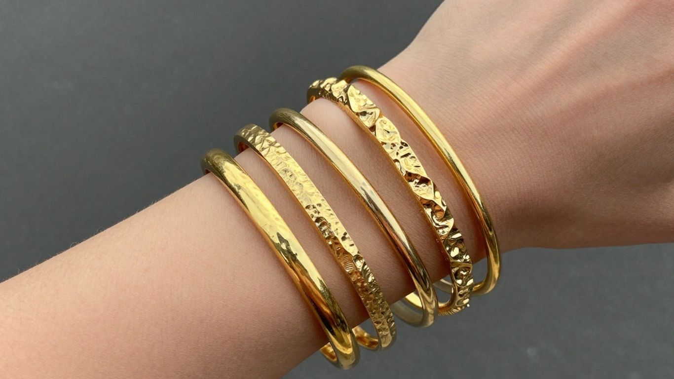 Layering gold bangles