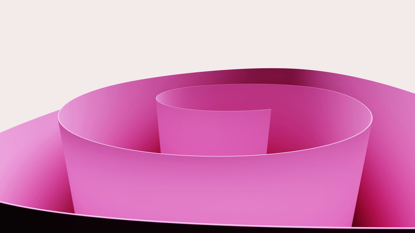 A pink yoga mat in a calm studio