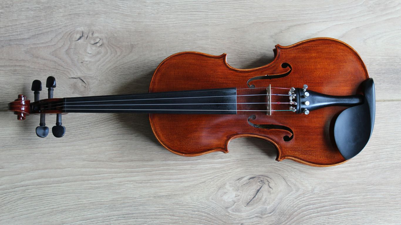 Finished violins prepared for quality inspection