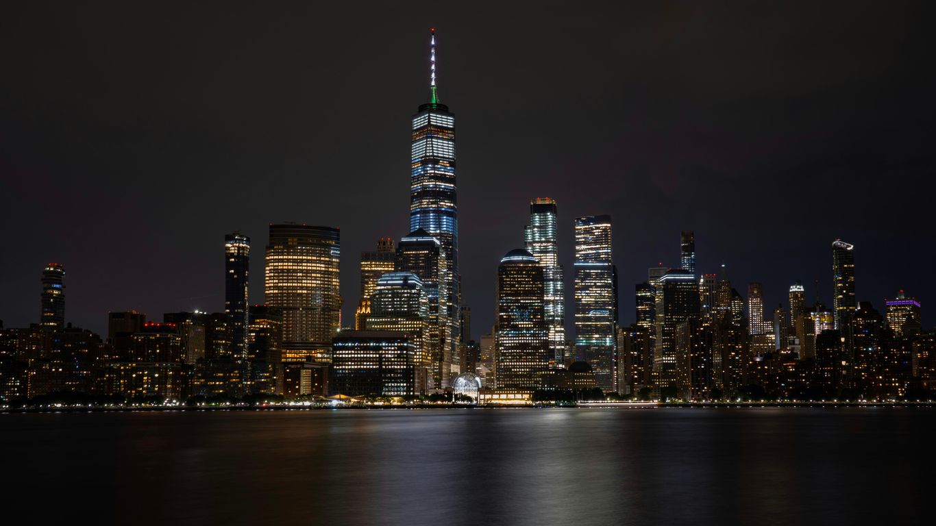 Glowing lights shine over the bay