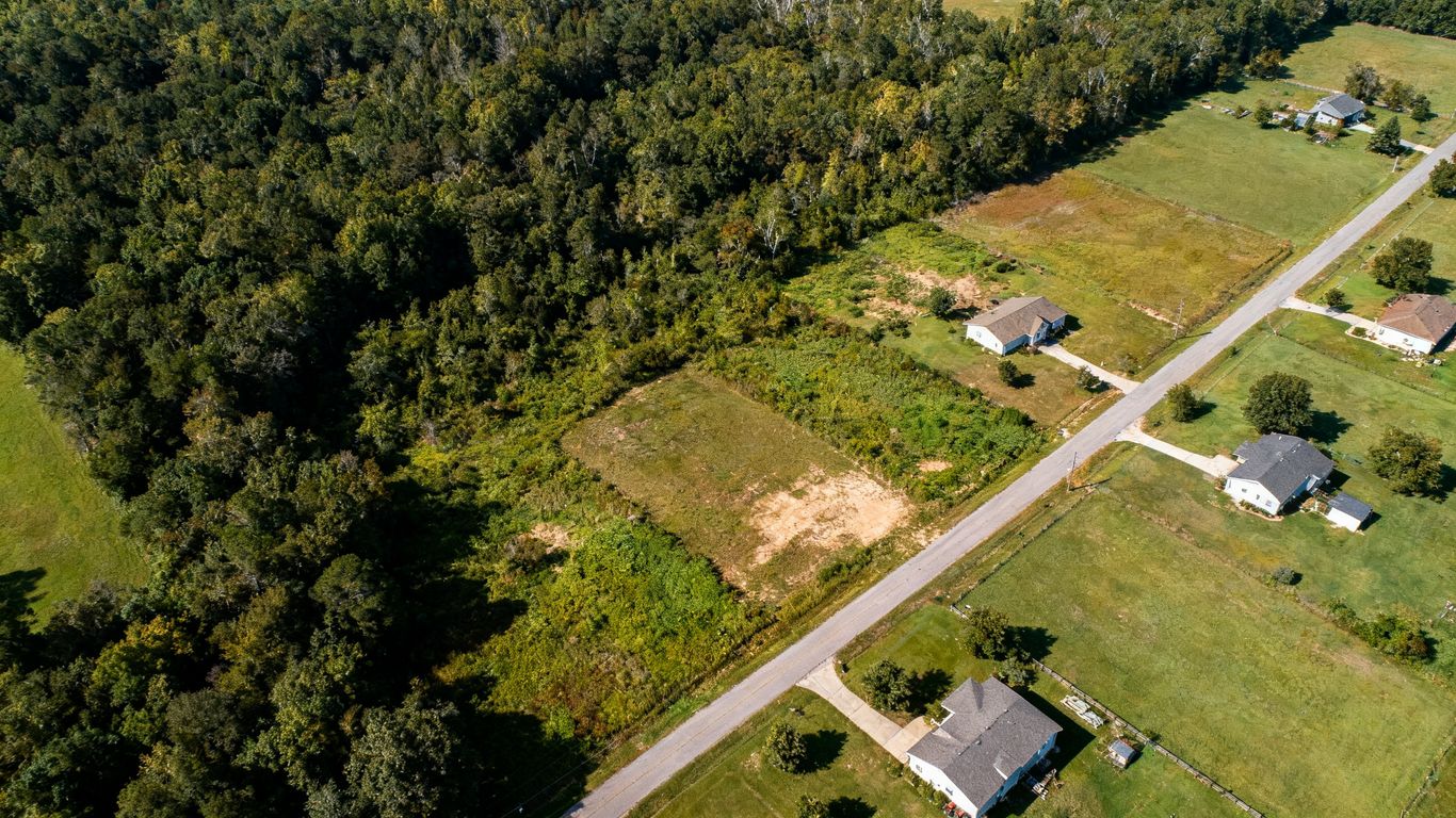 Drone mapping a forest edge near homes