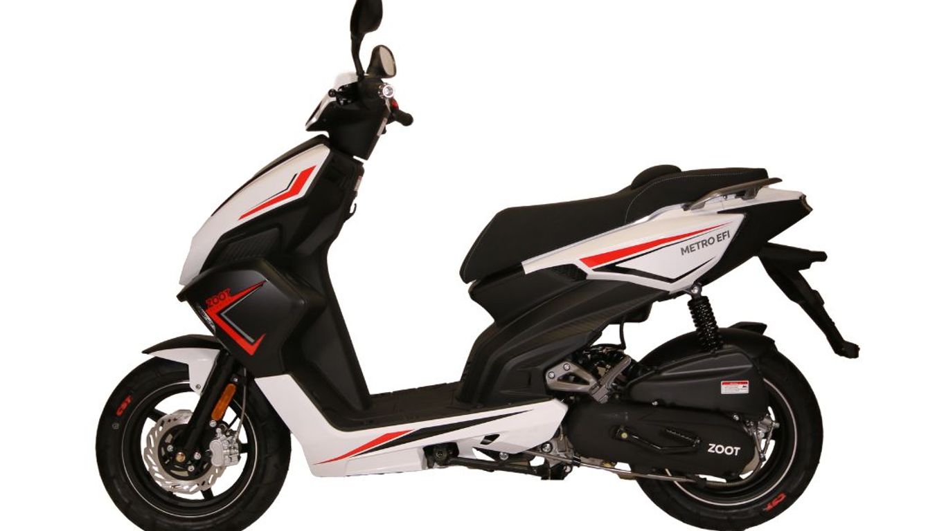 A white and black Zoot scooter with red accents is shown.