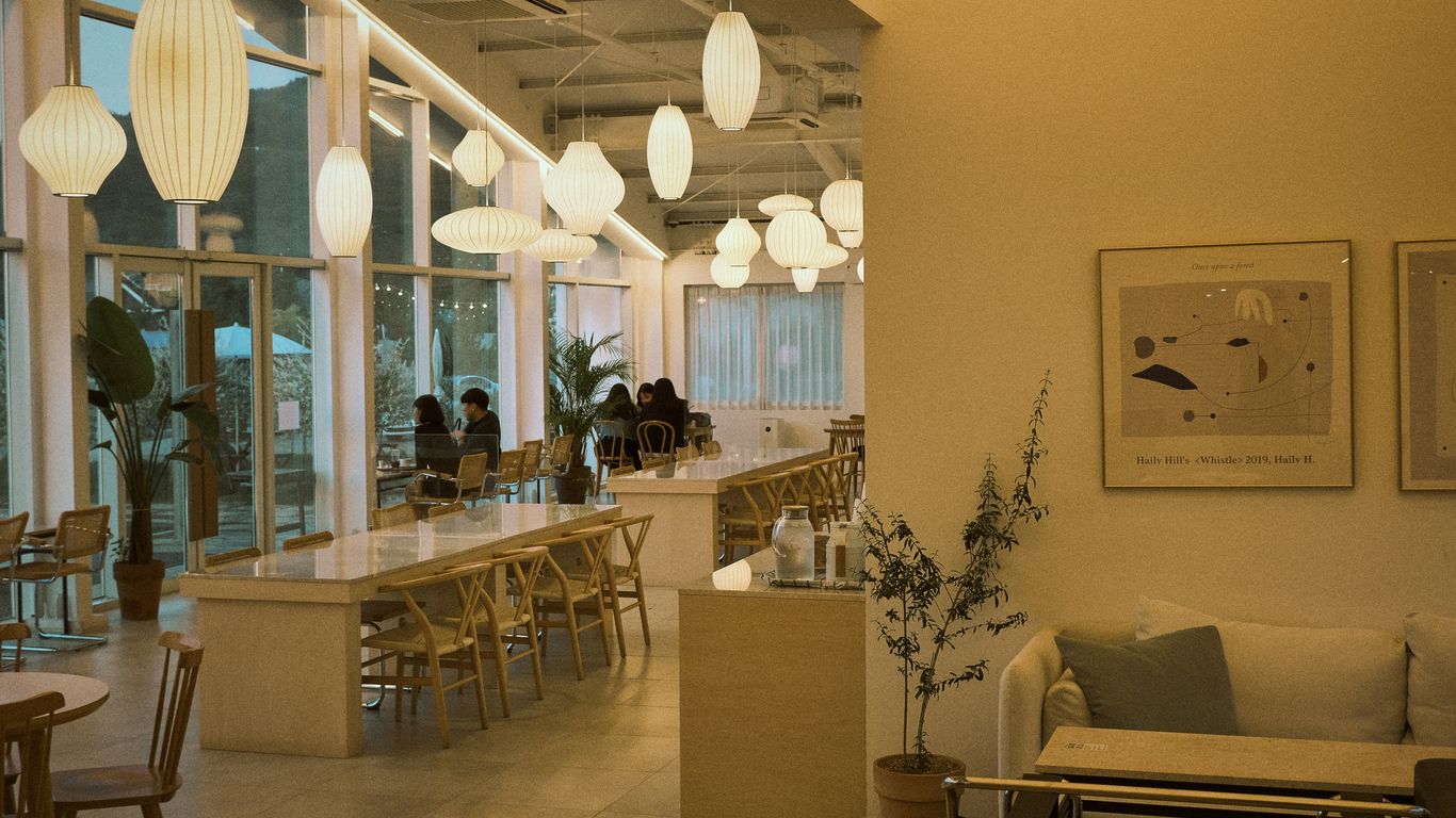 white and brown wooden dining table and chairs