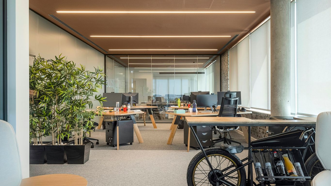 Humanoid robot in modern workspace