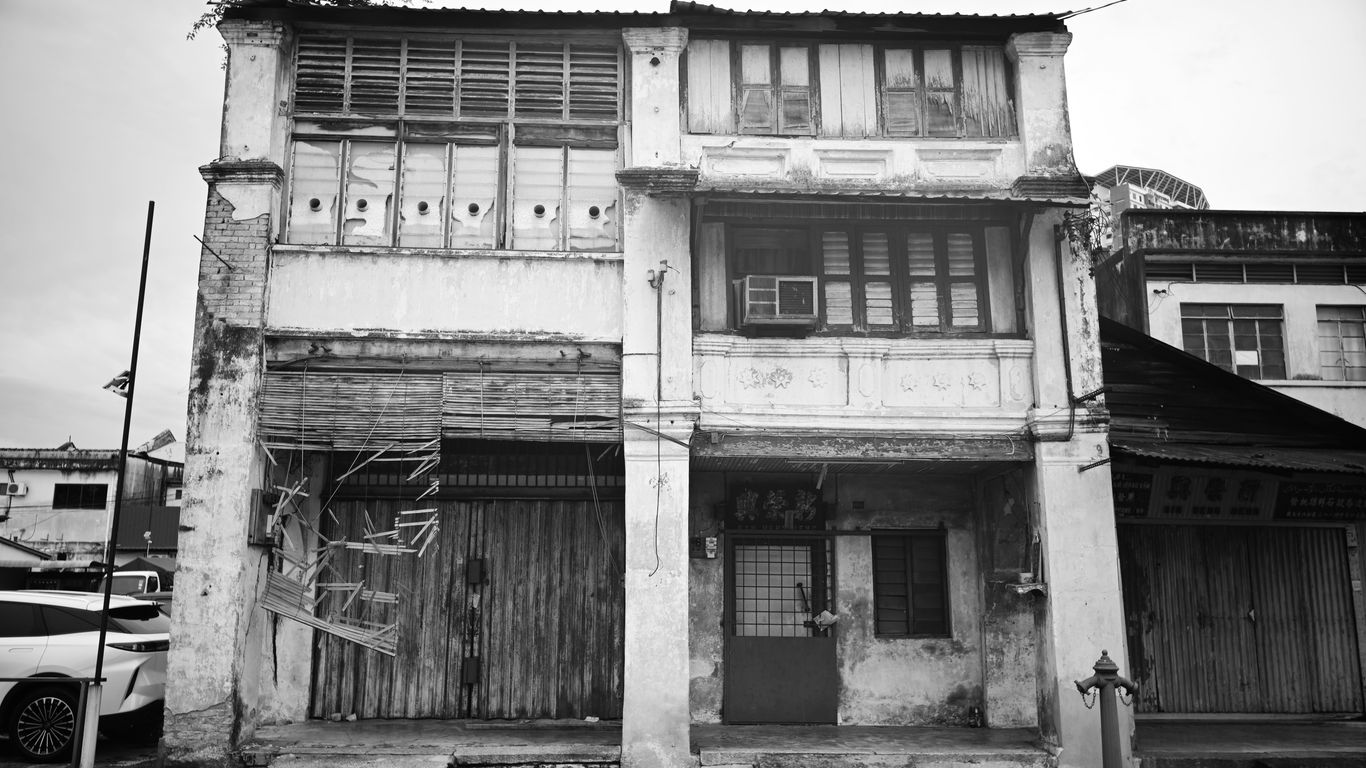 Historical shophouses lining the busy street