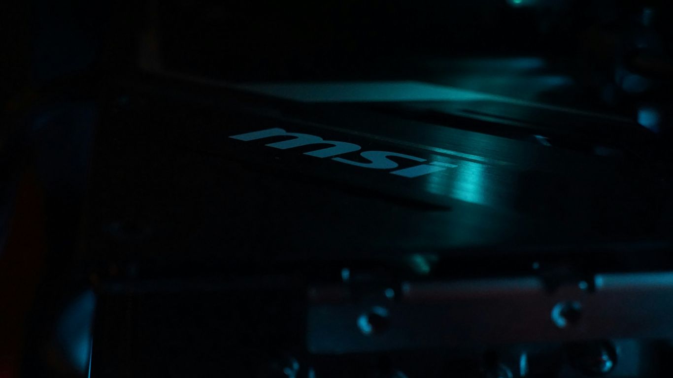 A close up of a computer case in the dark