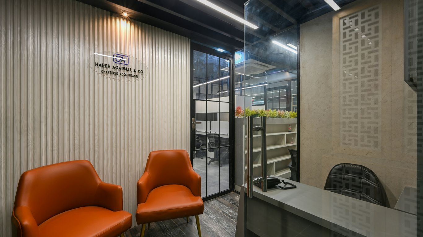 a room with chairs and a table