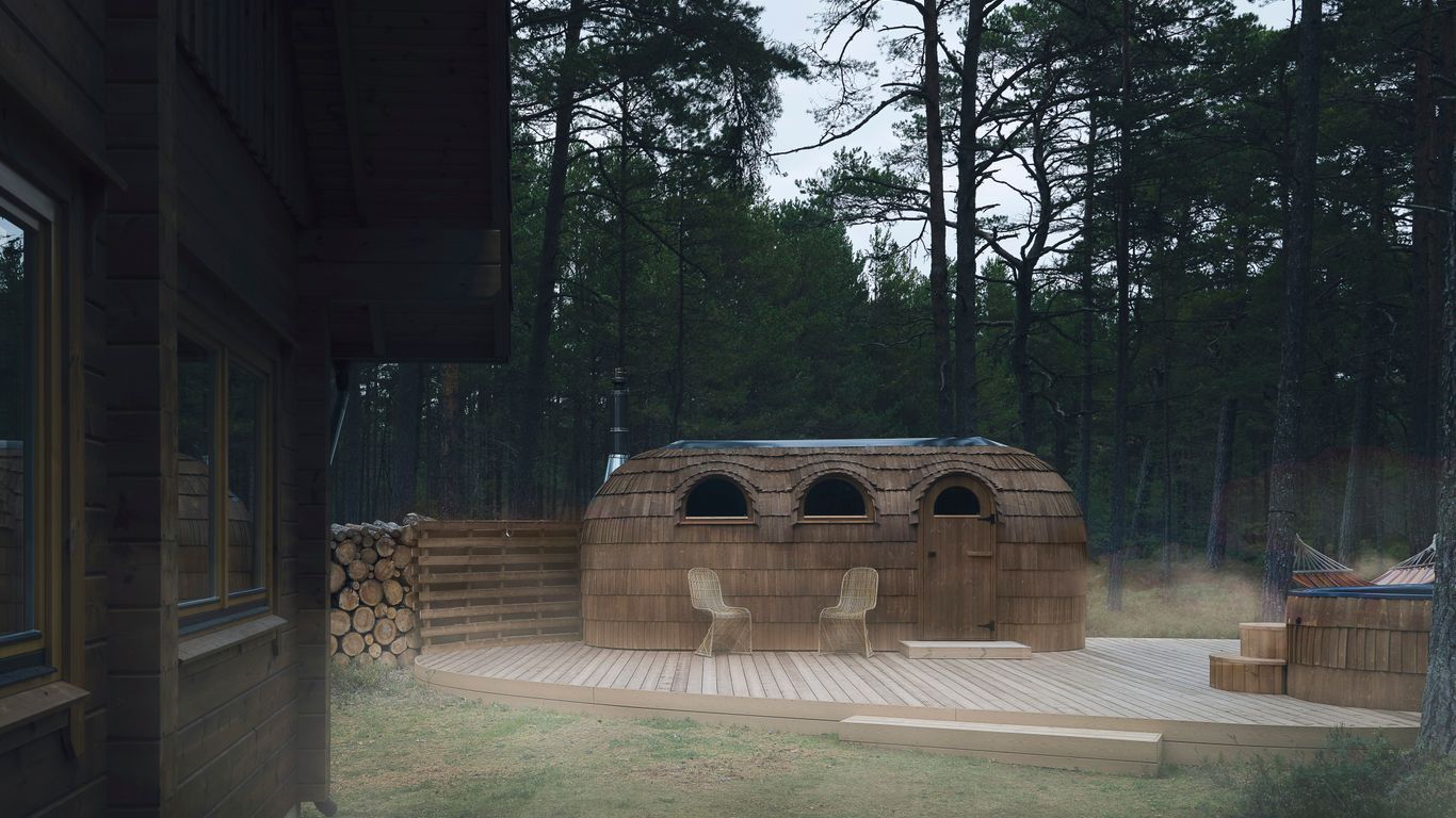 A house in the middle of a wooded area