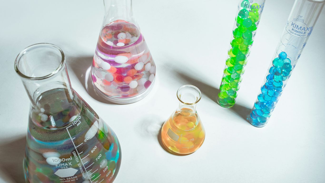 Materials researchers examining atomic crystal models