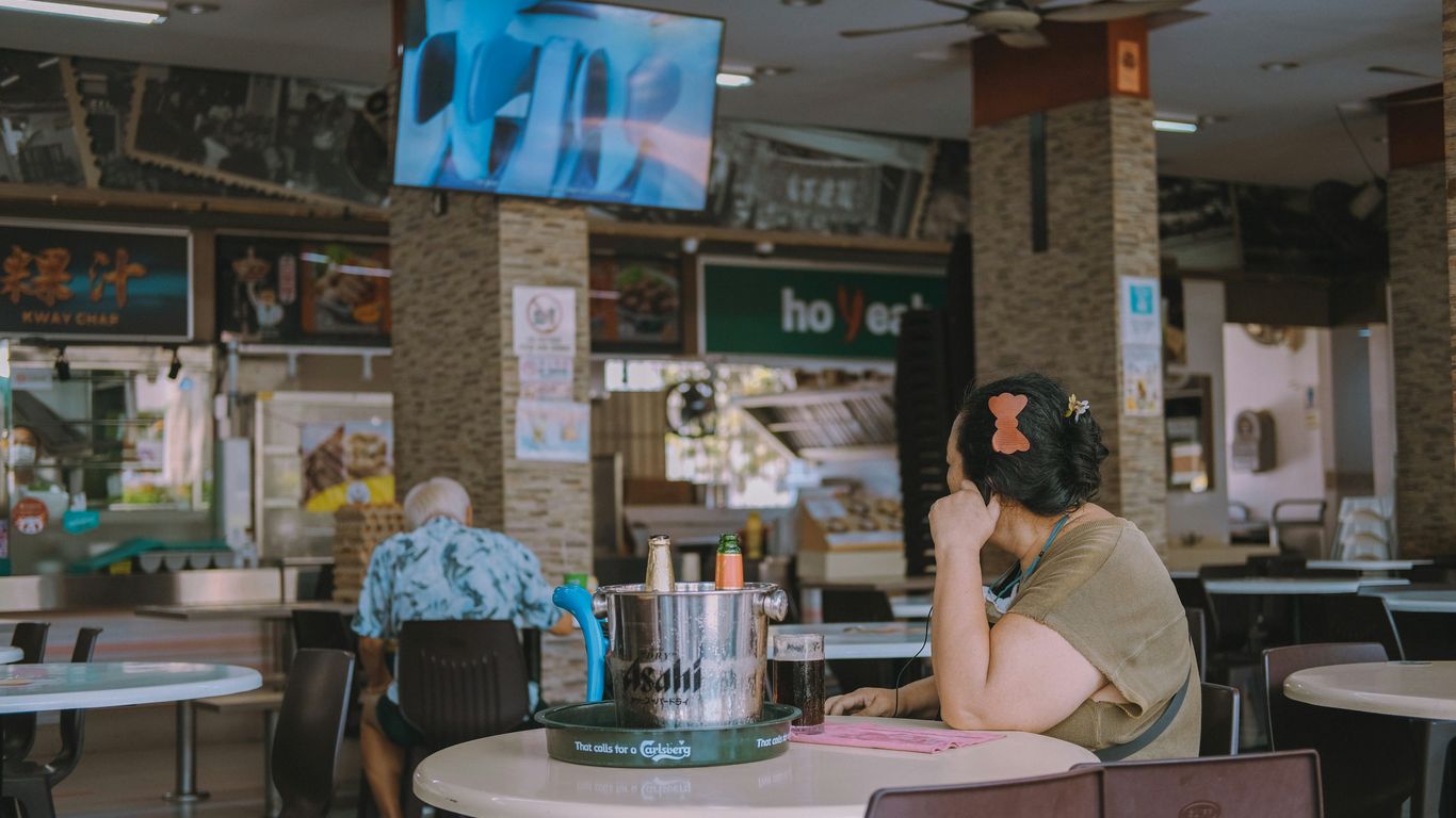 Traditional Singapore coffee shop with tiled tables