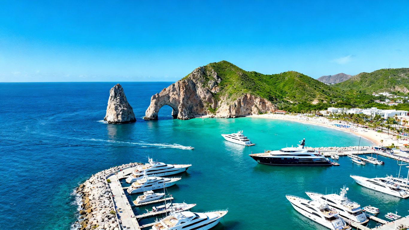 Cabo San Lucas cruise port with yachts and the Arch.