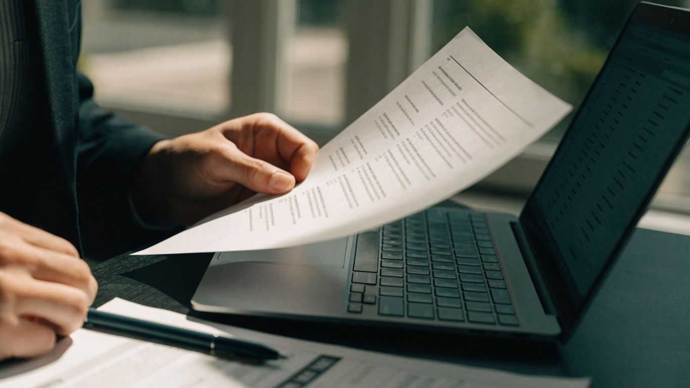 Reviewing scanned statement pages beside extracted text