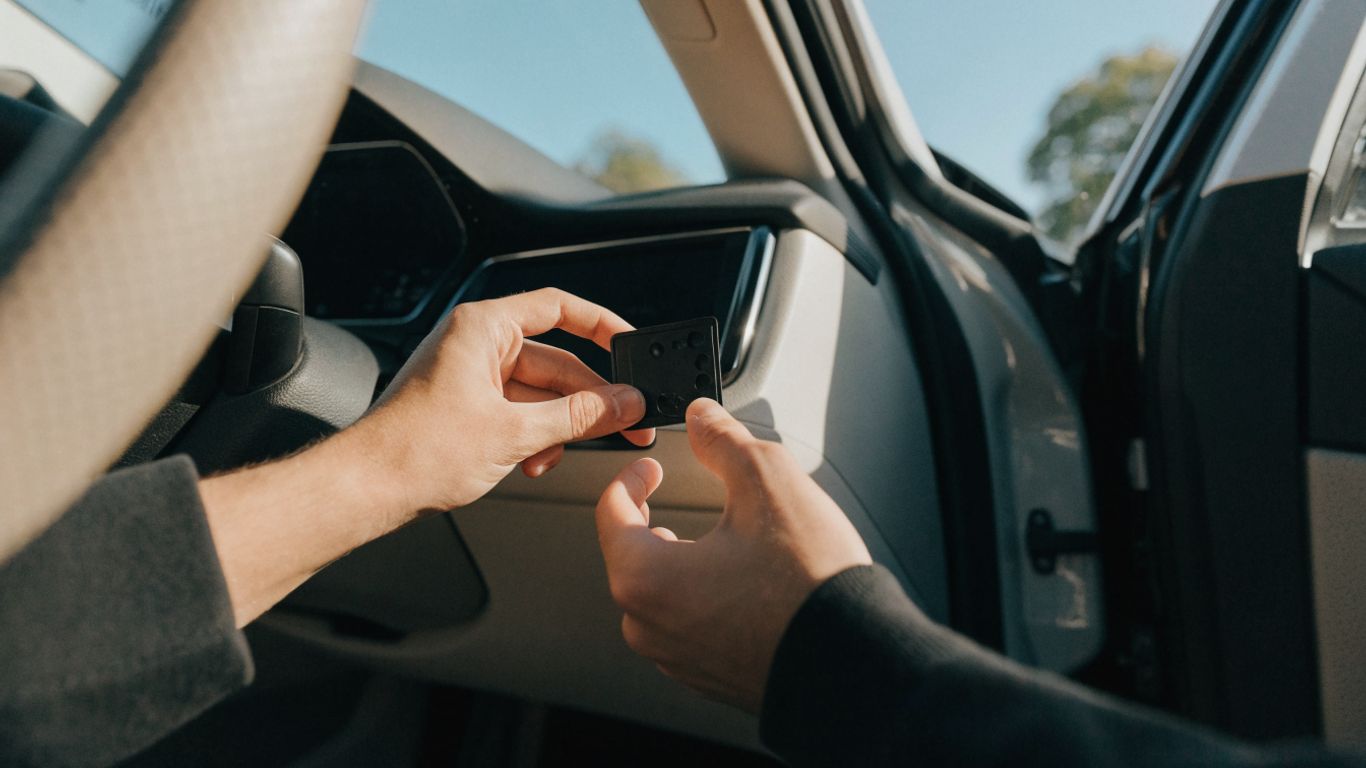 Vehicle identification details beside a car